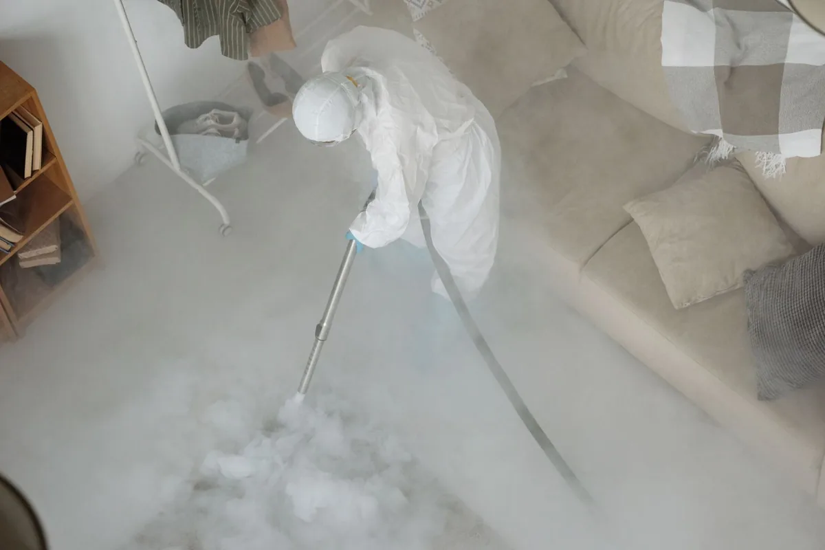 Biohazard cleanup technician in protective equipment, Vineyard, UT